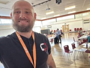 Cameron Parker working with teachers at Bourne End Academy